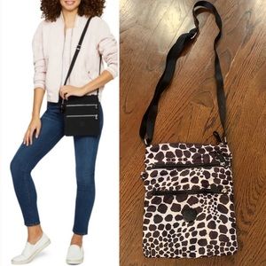 EUC Kipling Black/White Animal Print Cross body